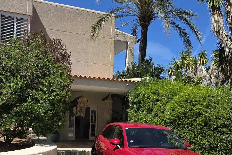 Haus mit Palmen – Veranstaltungsort auf Ibiza